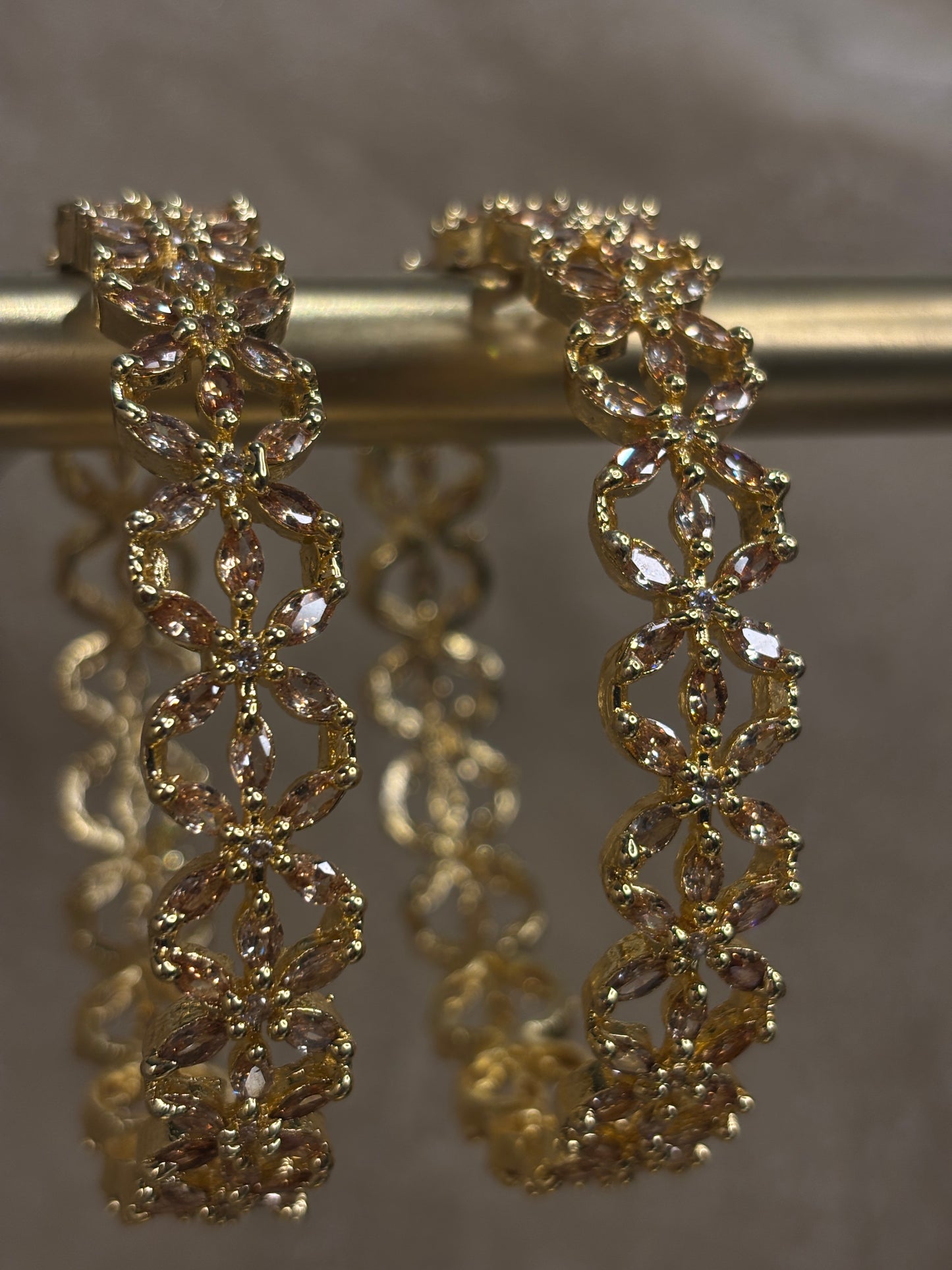 Gold American diamond kare
