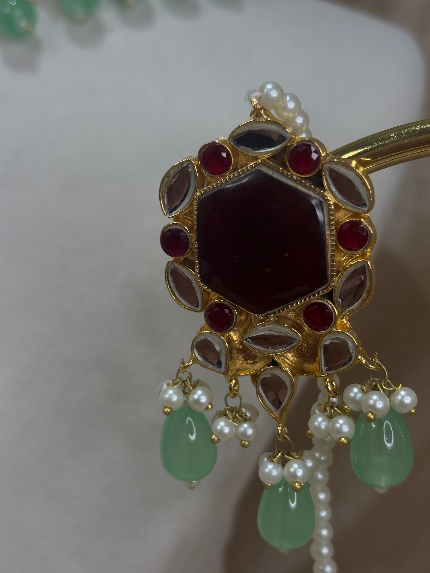 Maroon and mint green Farshi kundan set