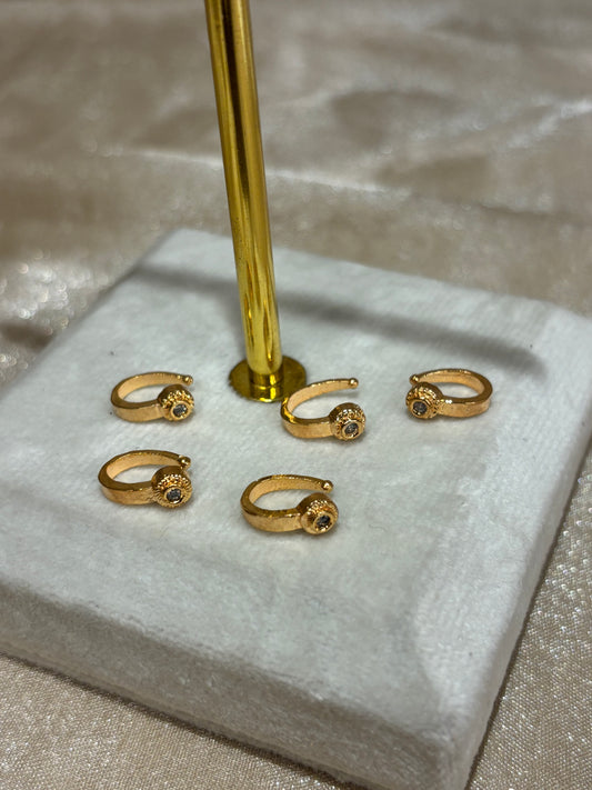 Gold nose stud