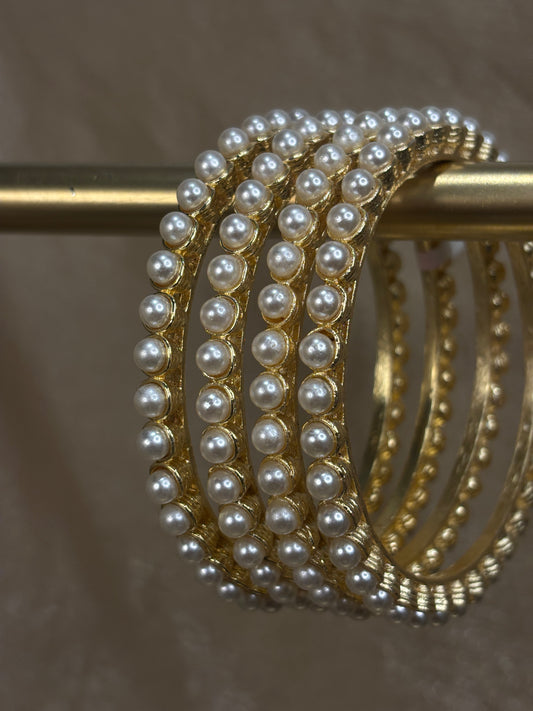 Yellow gold pearl kare