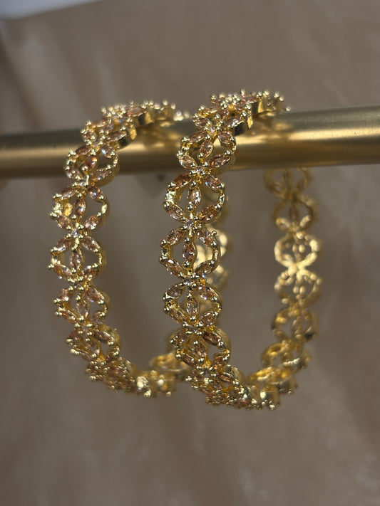 Gold American diamond kare
