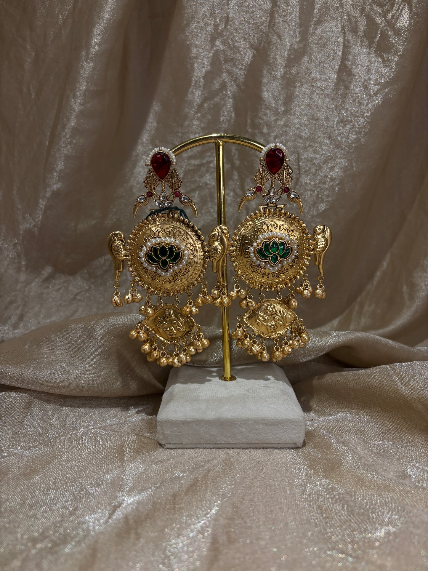 maroon and green statement earrings