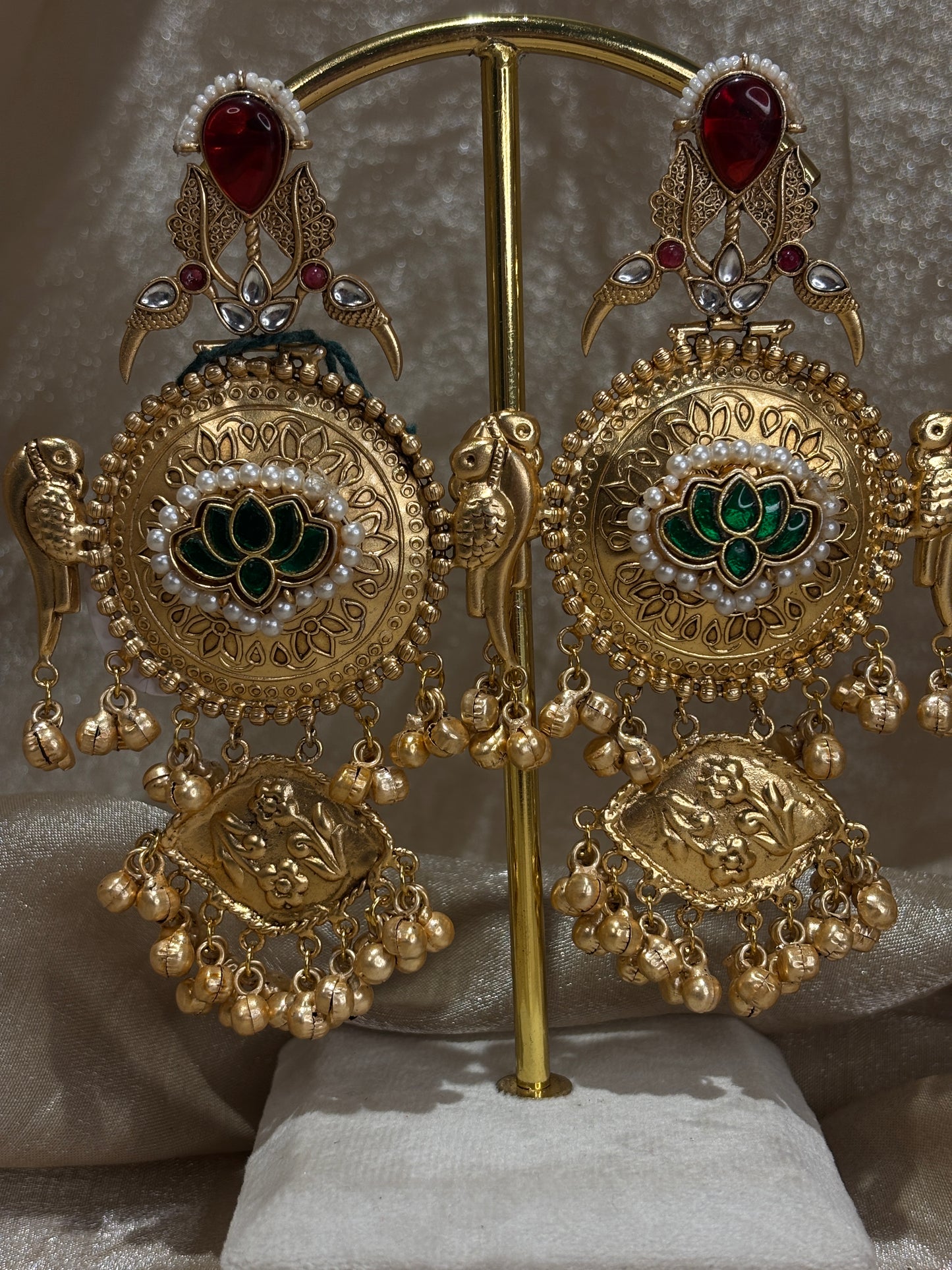 maroon and green statement earrings