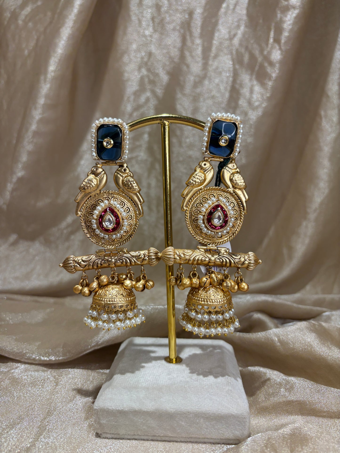 blue and hot pink statement earrings