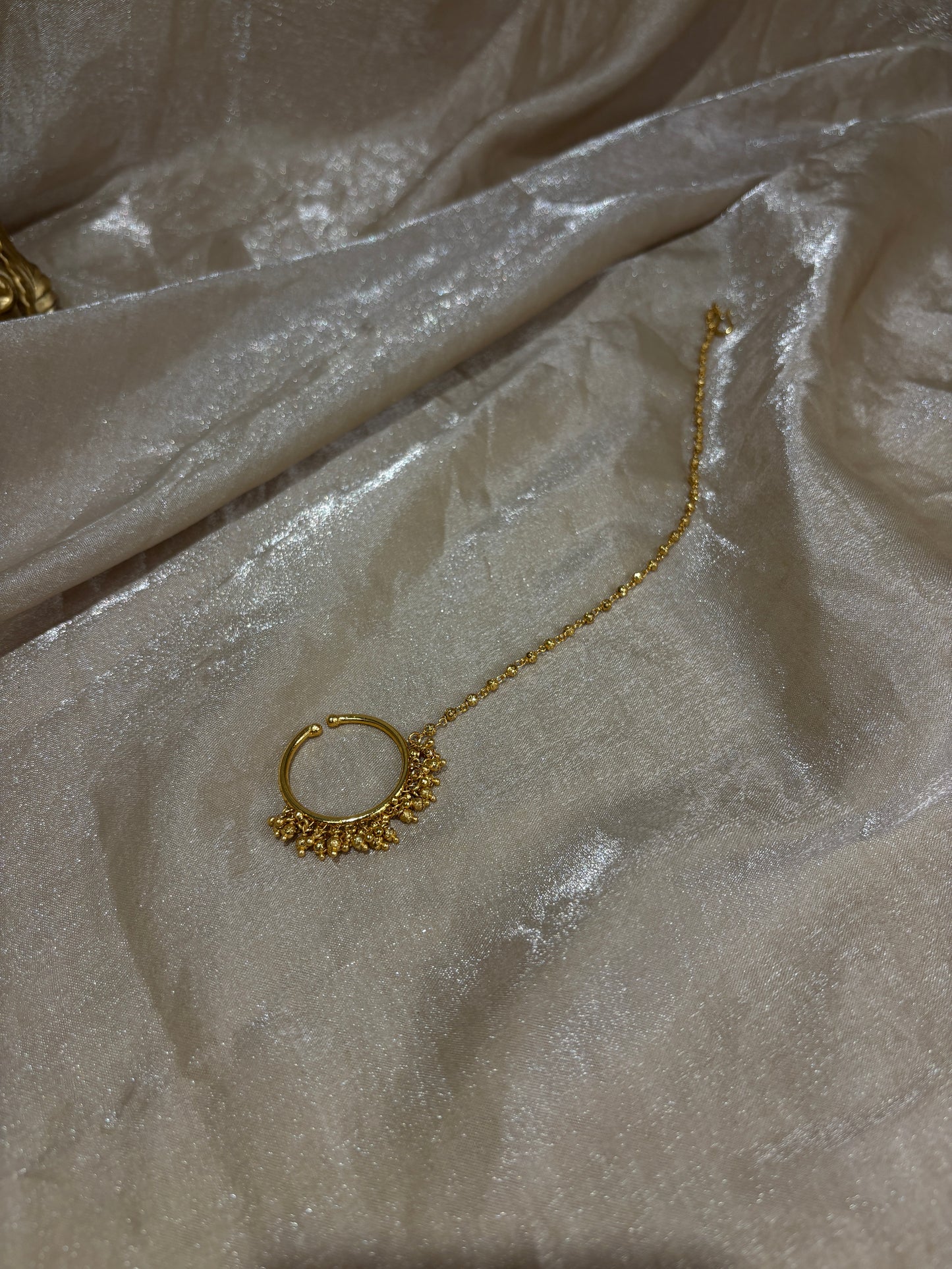 gold-look nose ring