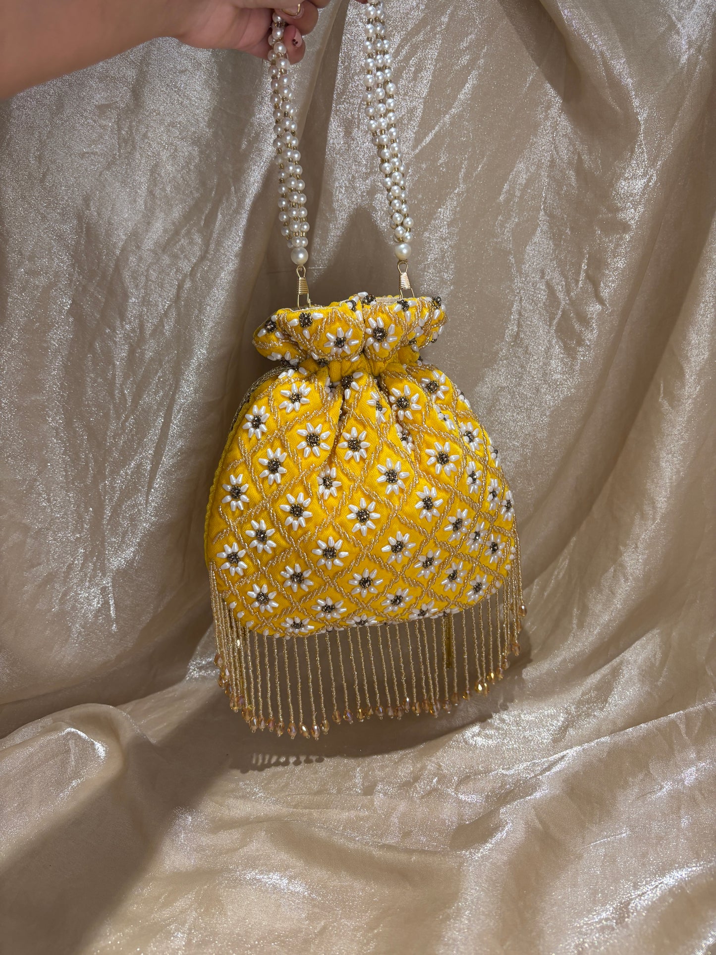 yellow potli purse