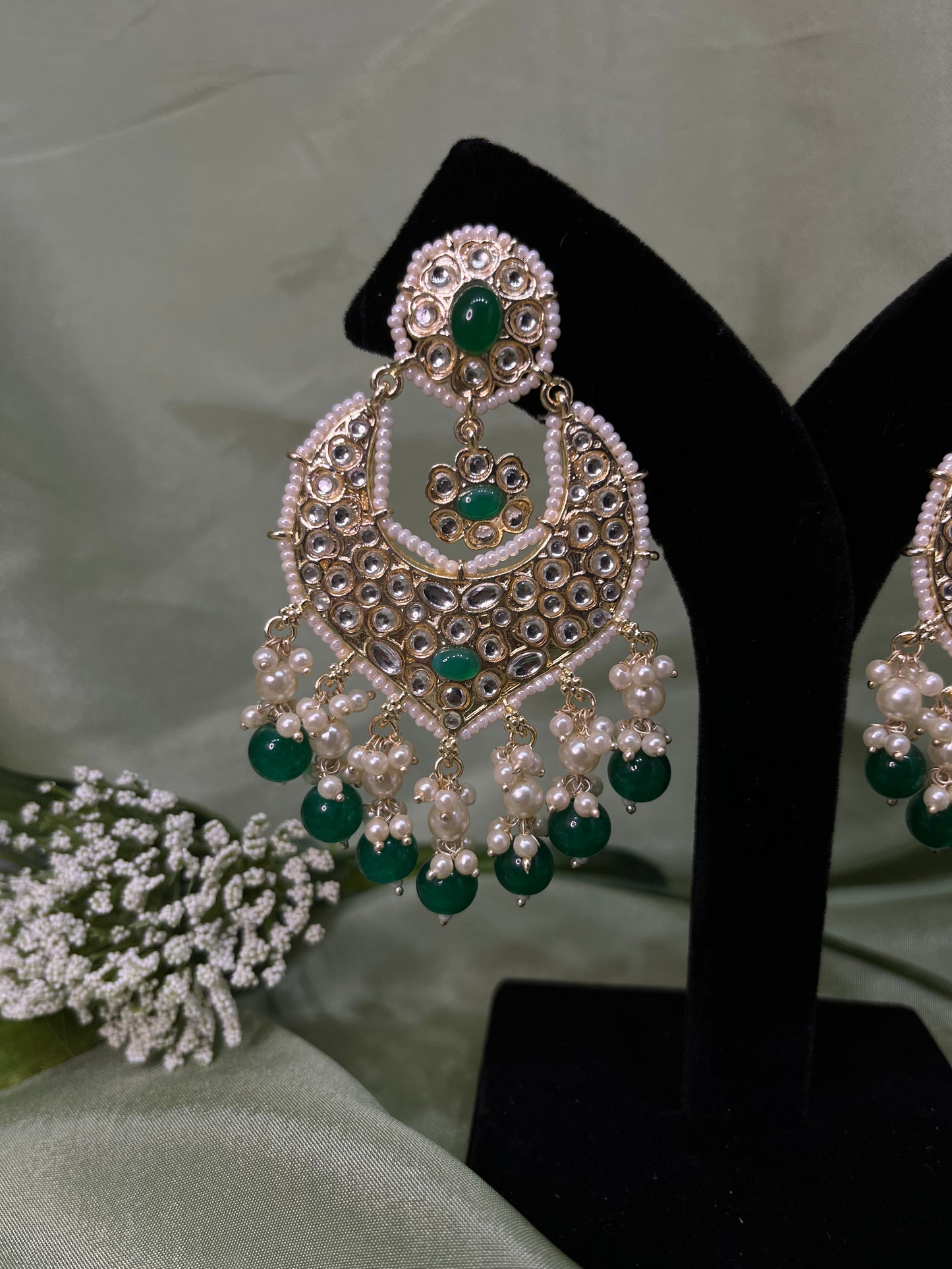 Green white kundan earrings