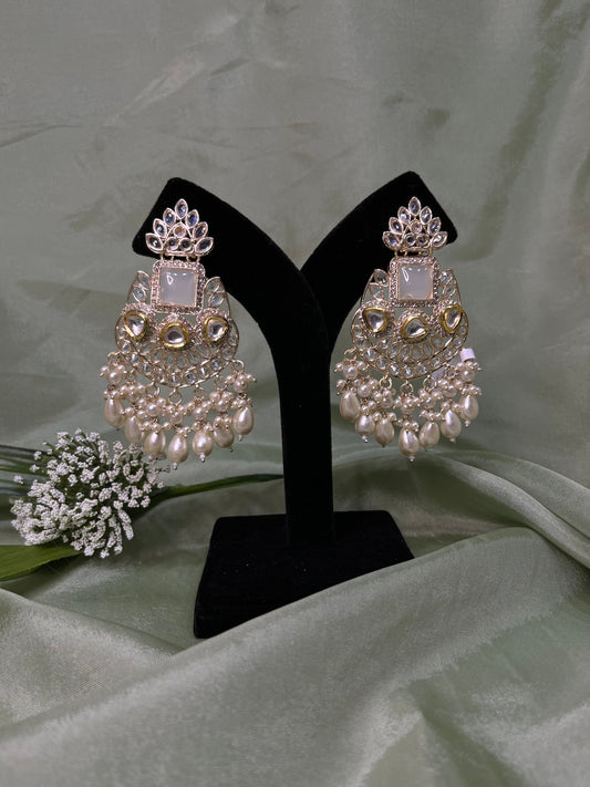 White statement earrings