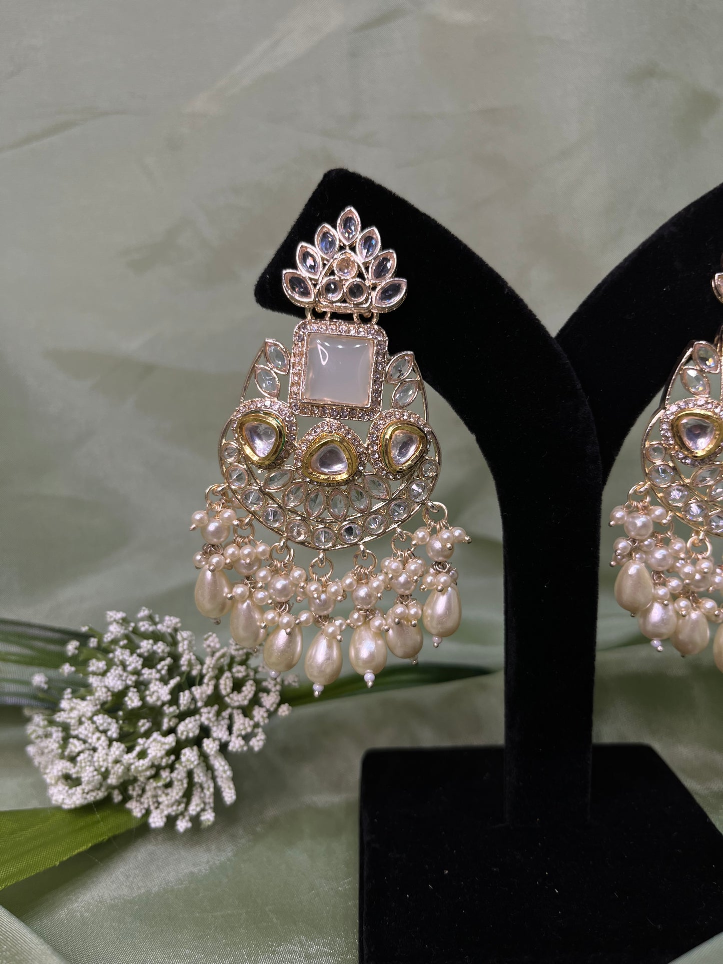 White statement earrings