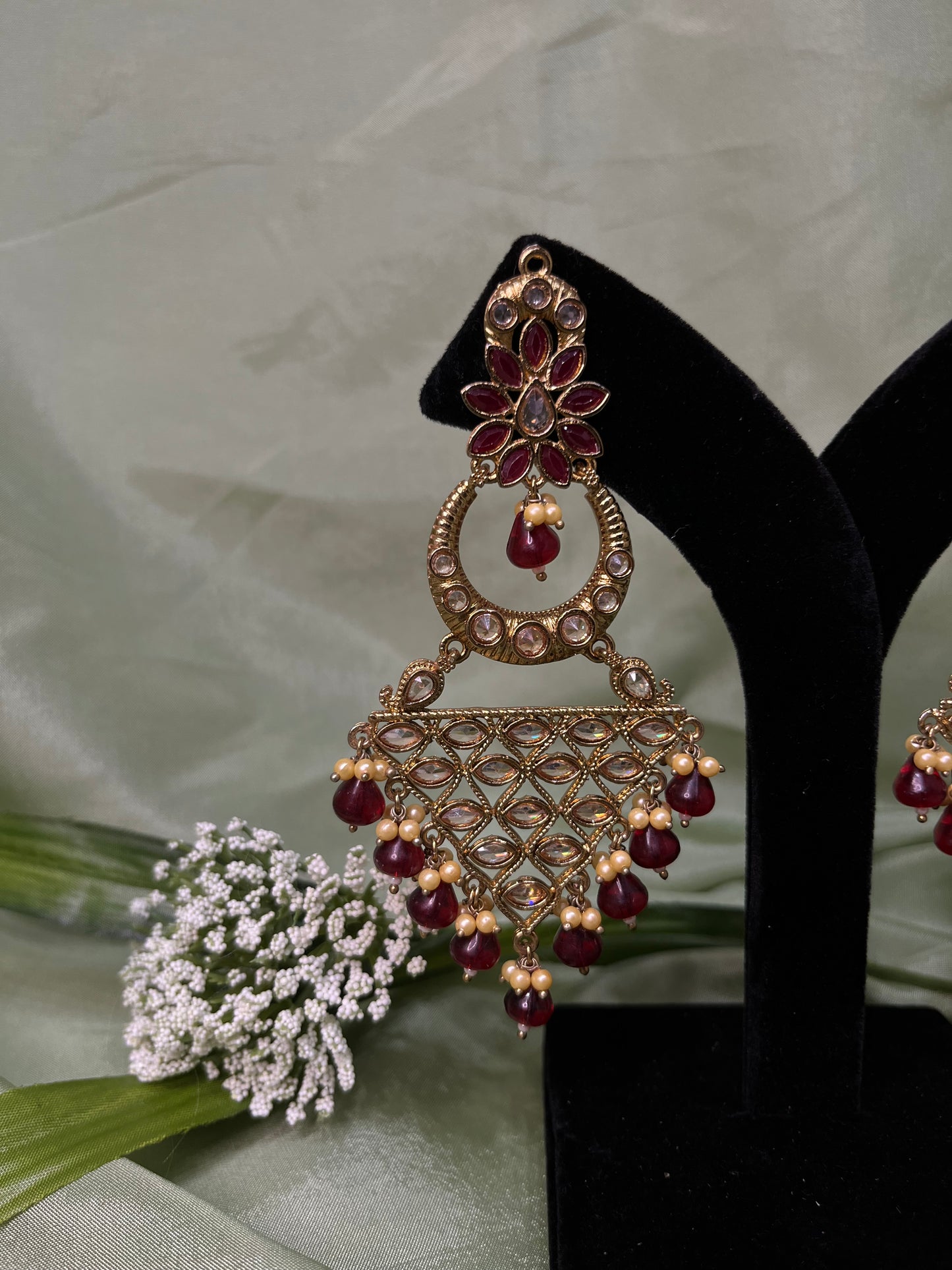 Maroon statement earrings