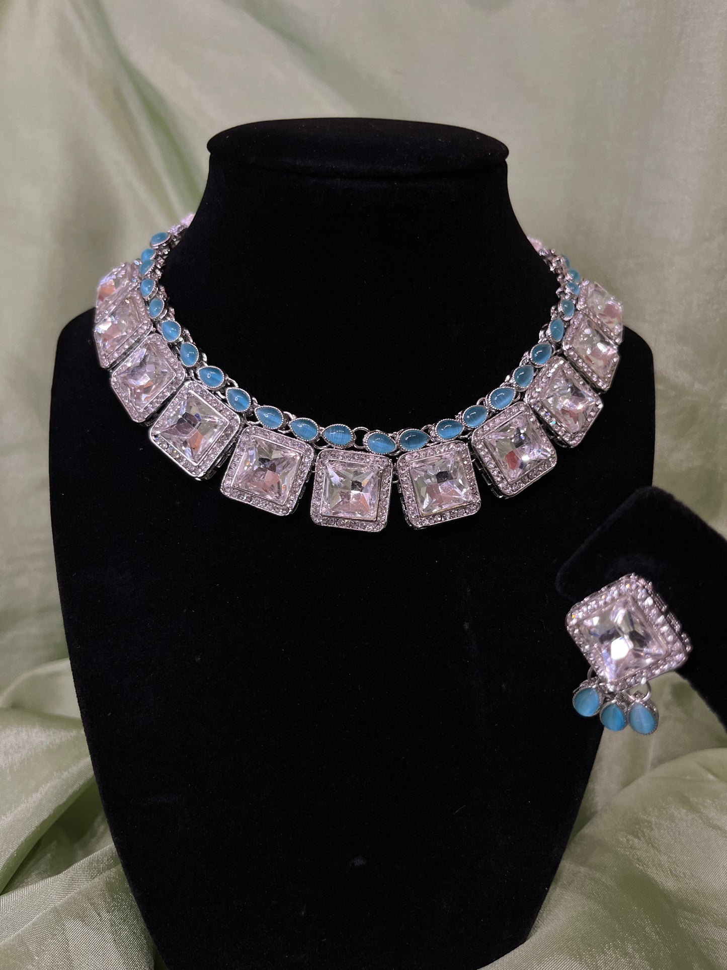 Light blue American diamond set