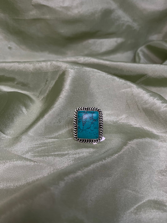 Teal oxidized ring