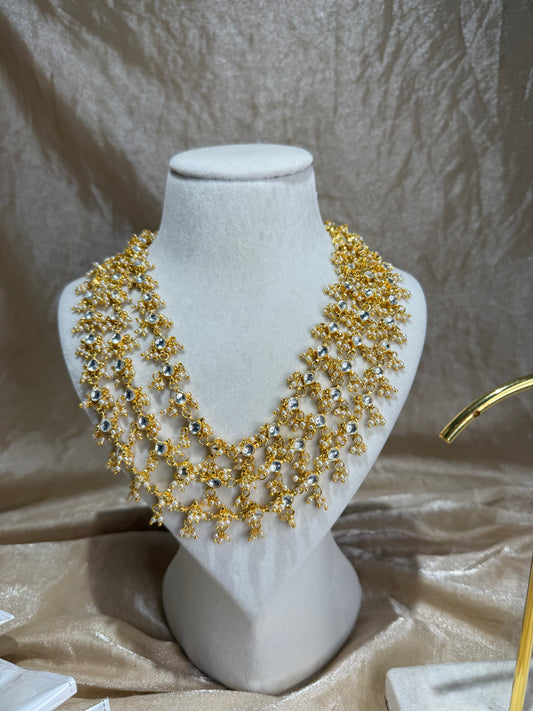 long gold necklace