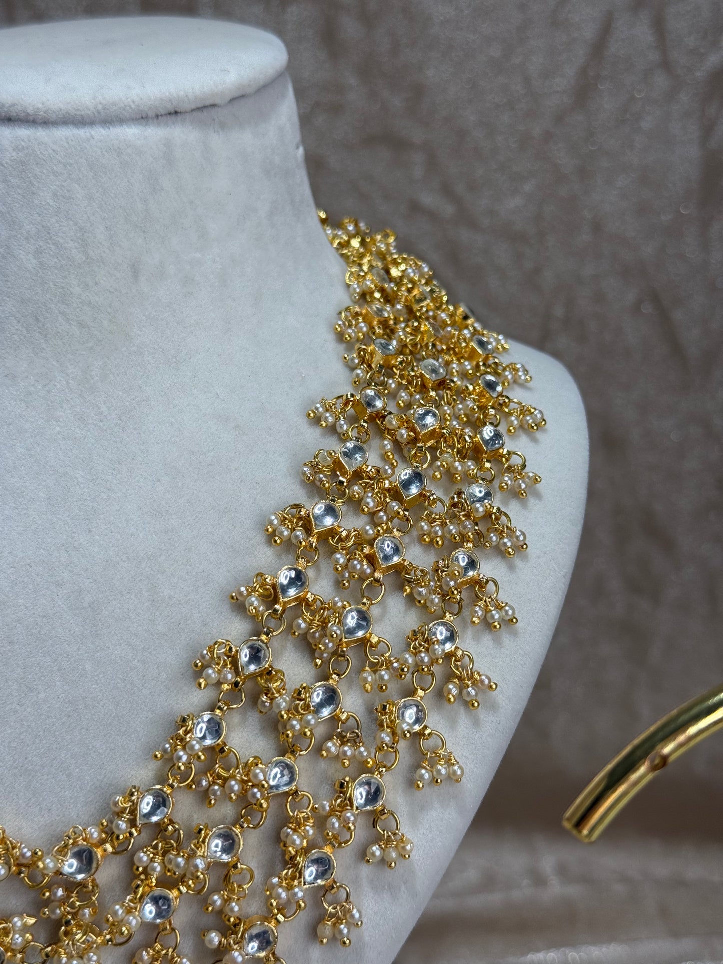 long gold necklace