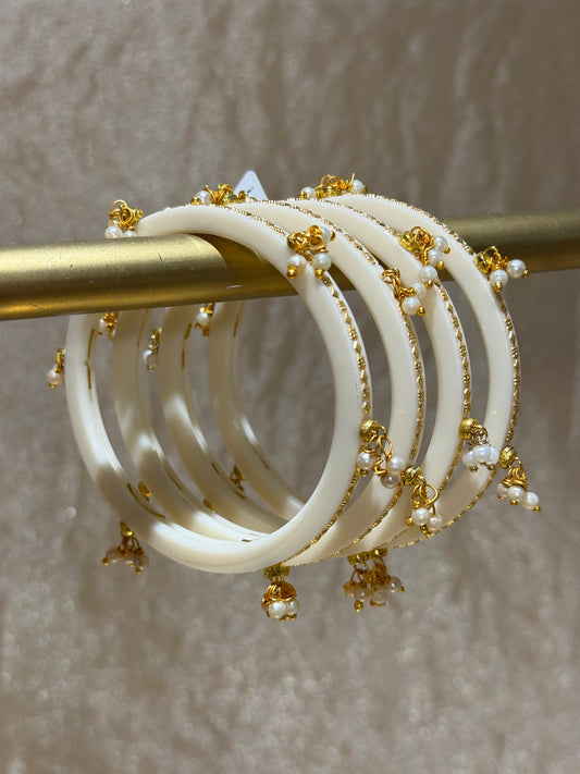 white/gold accent bangles