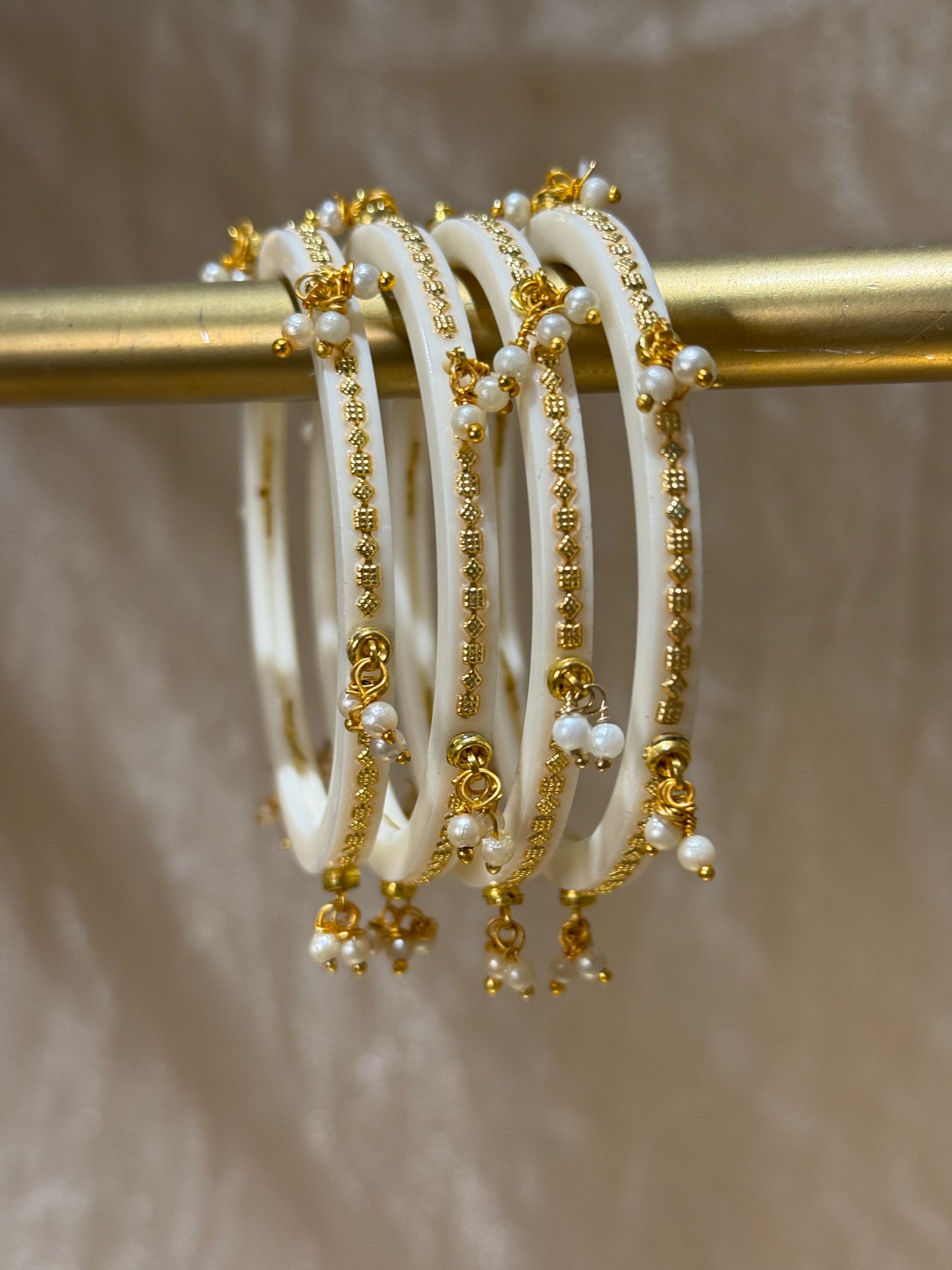 white/gold accent bangles