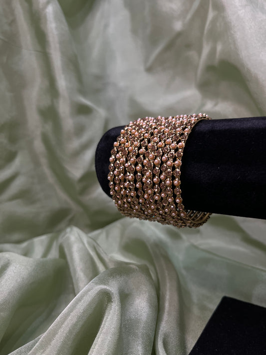 Gold and pearl polki bangles