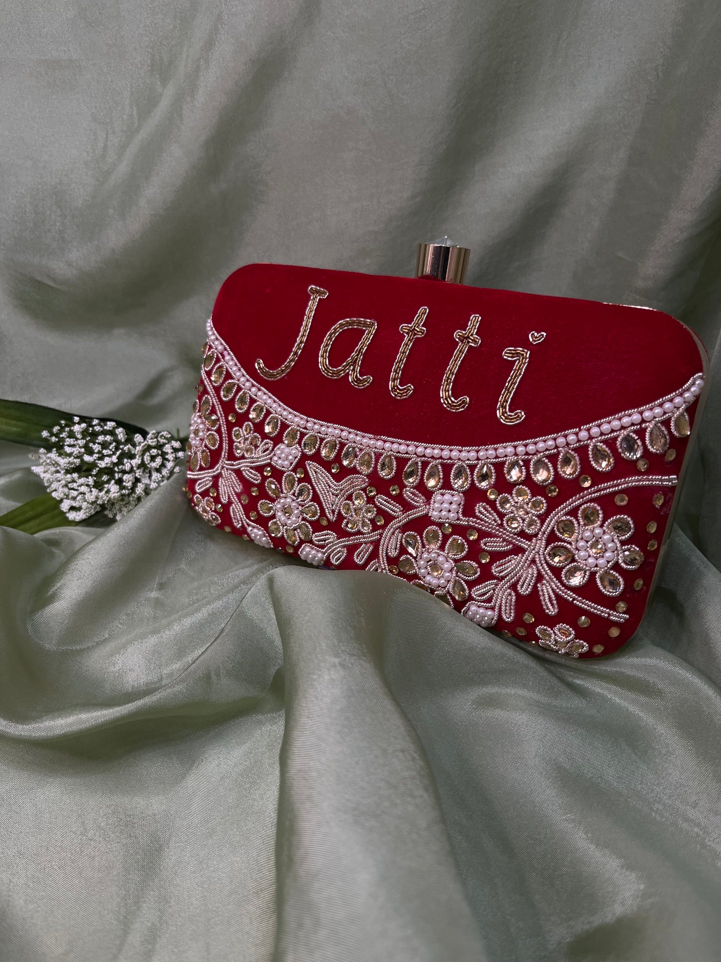 Red jatti clutch
