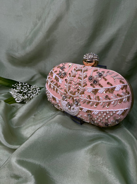 Peach oval clutch